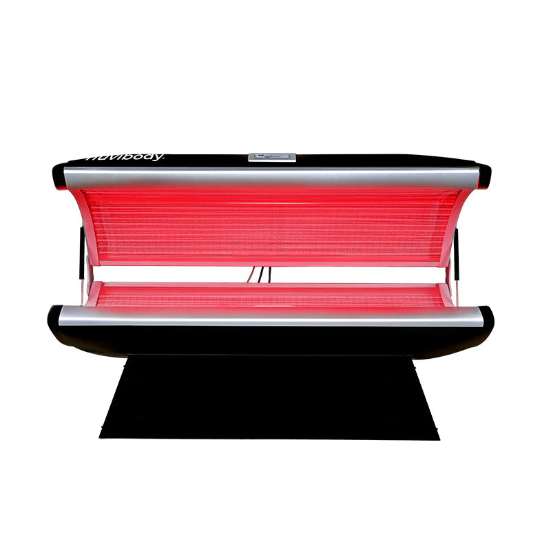 Nuvibody LITE Red Light Therapy Bed front view with LED panels illuminated for advanced photobiomodulation.