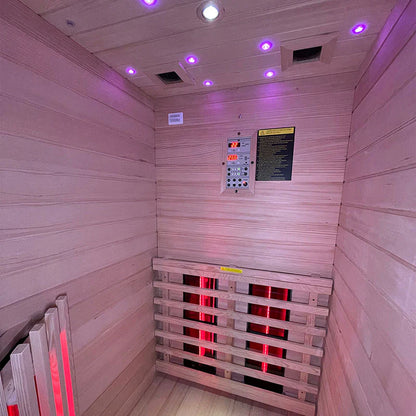 Insignia KY001 infrared sauna interior with digital control panel and chromotherapy ceiling LEDs.
